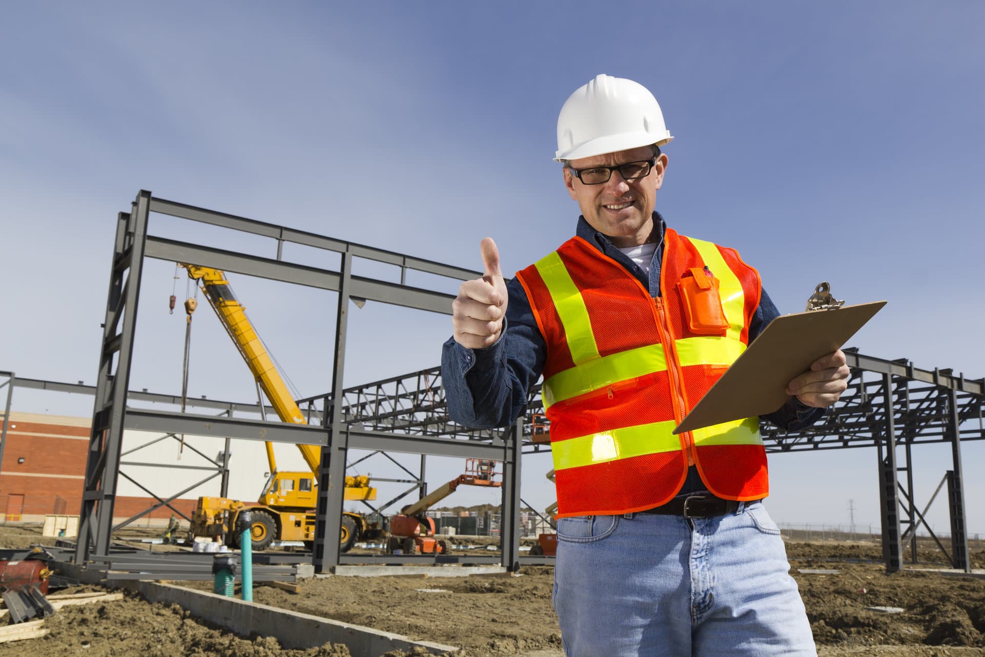Construction worker maintaining project deadlines at worksite